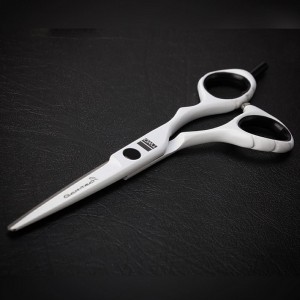 two white professional hair cutting shears